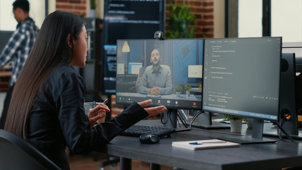 Hire WordPress developers at Dazzlebirds — client and developer reviewing WordPress web development services project together 